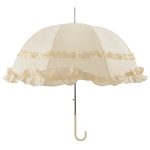 Elegant ivory wedding umbrella with frilled edges for outdoor ceremonies.